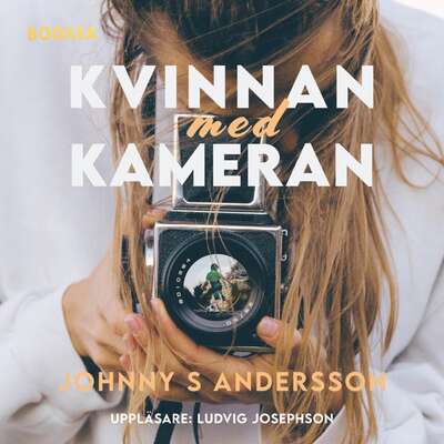 Kvinnan med kameran - Johnny S. Andersson.